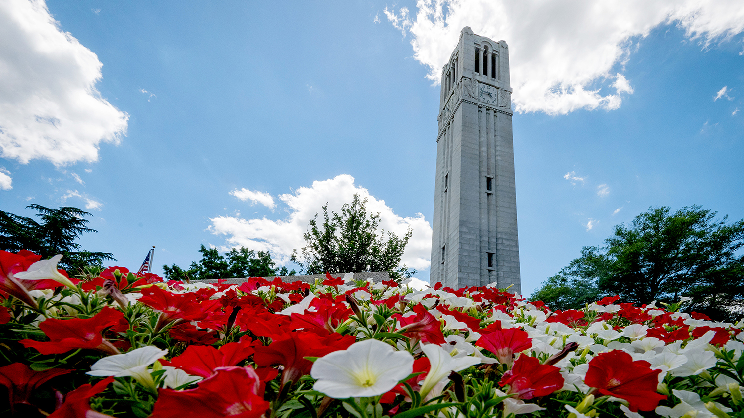 The Belltower is framed with spring flowers on a warm May afternoon. Photo by Becky Kirkland.