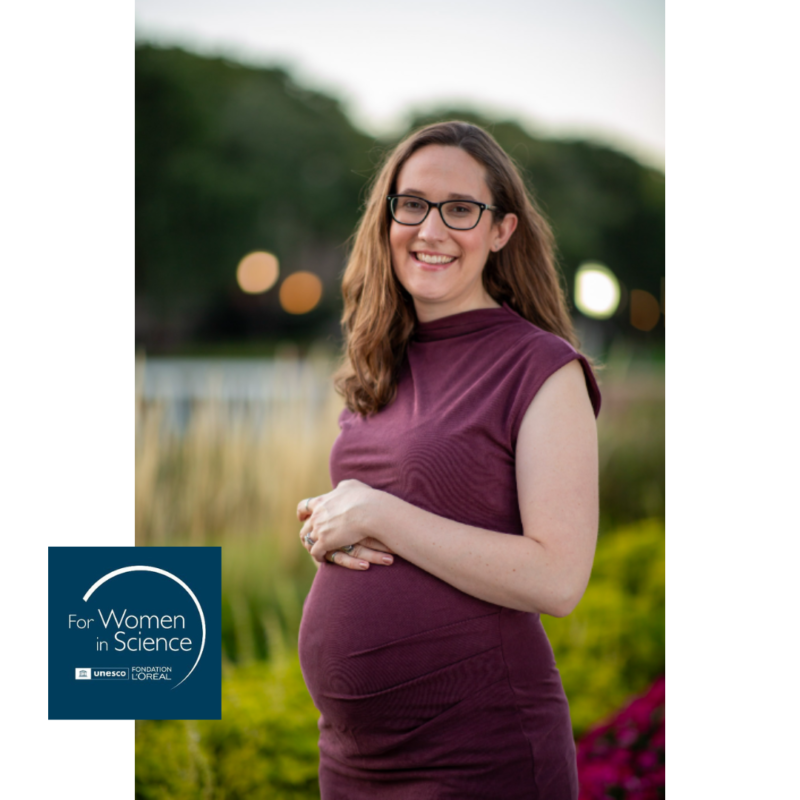 pregnant woman with dark hair wearing glasses and purple dress + For Women in Science logo