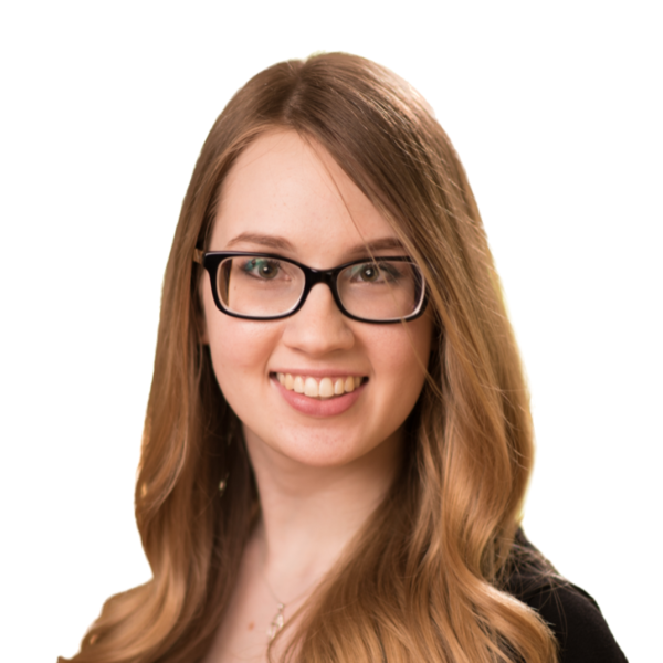 woman with long brown hair wearing glasses and a black shirt smiling